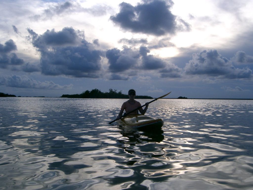 Kayaking as the sun is starting to set.