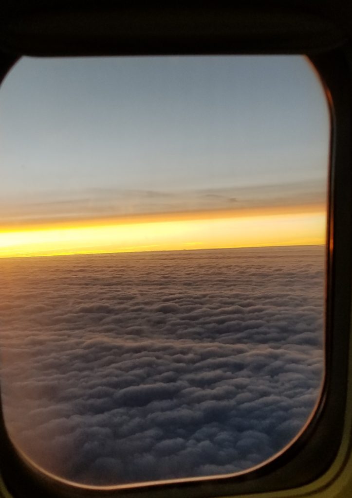 Catching sunrise over Europe from a plane
