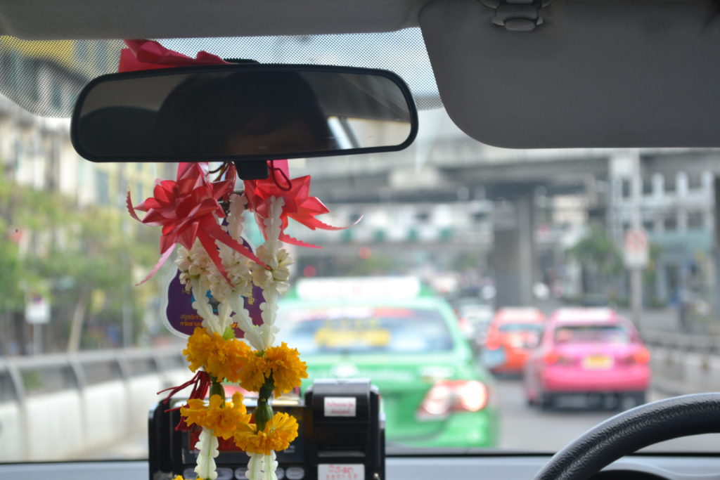 Peering out at the brightly colored taxis